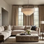 A contemporary living room bathed in warm inviting light A sleek chandelierfeat